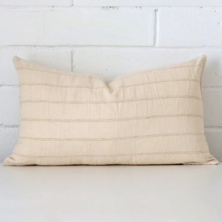 A superior designer cushion cover yielding a striped style and in a classy rectangle size.