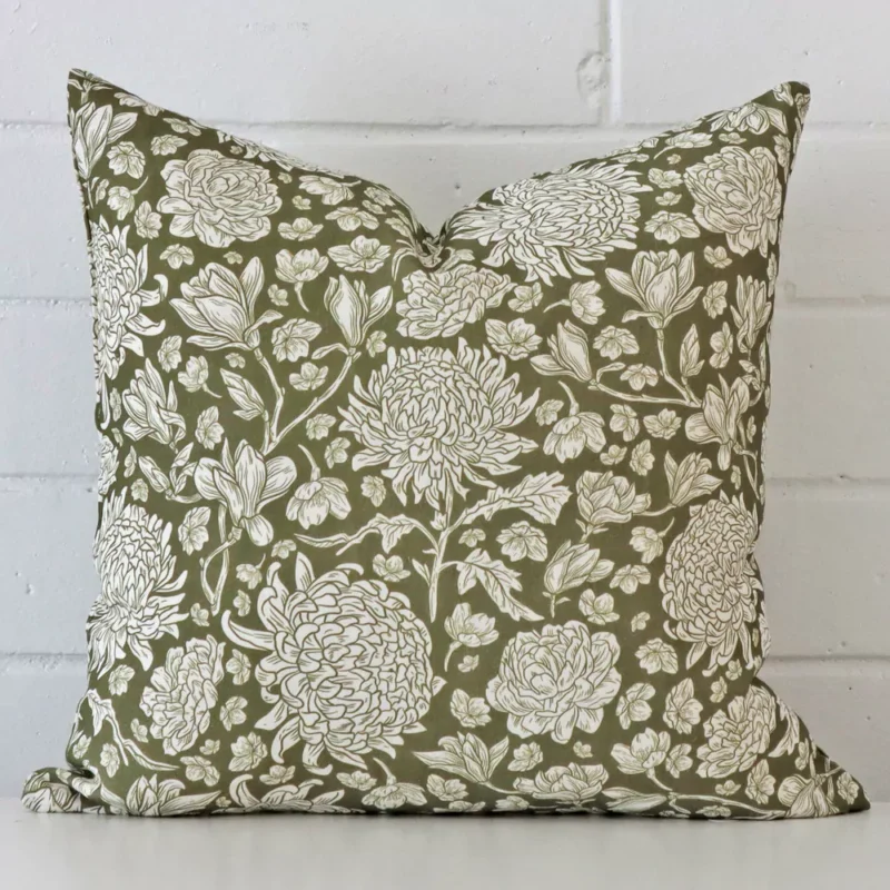 leo-linen-blue-geometric-cushion-cover-rectangle-sc1007-45 A hero shot of a floral square cushion cover. It is made from a deluxe linen fabric and features a green colour.