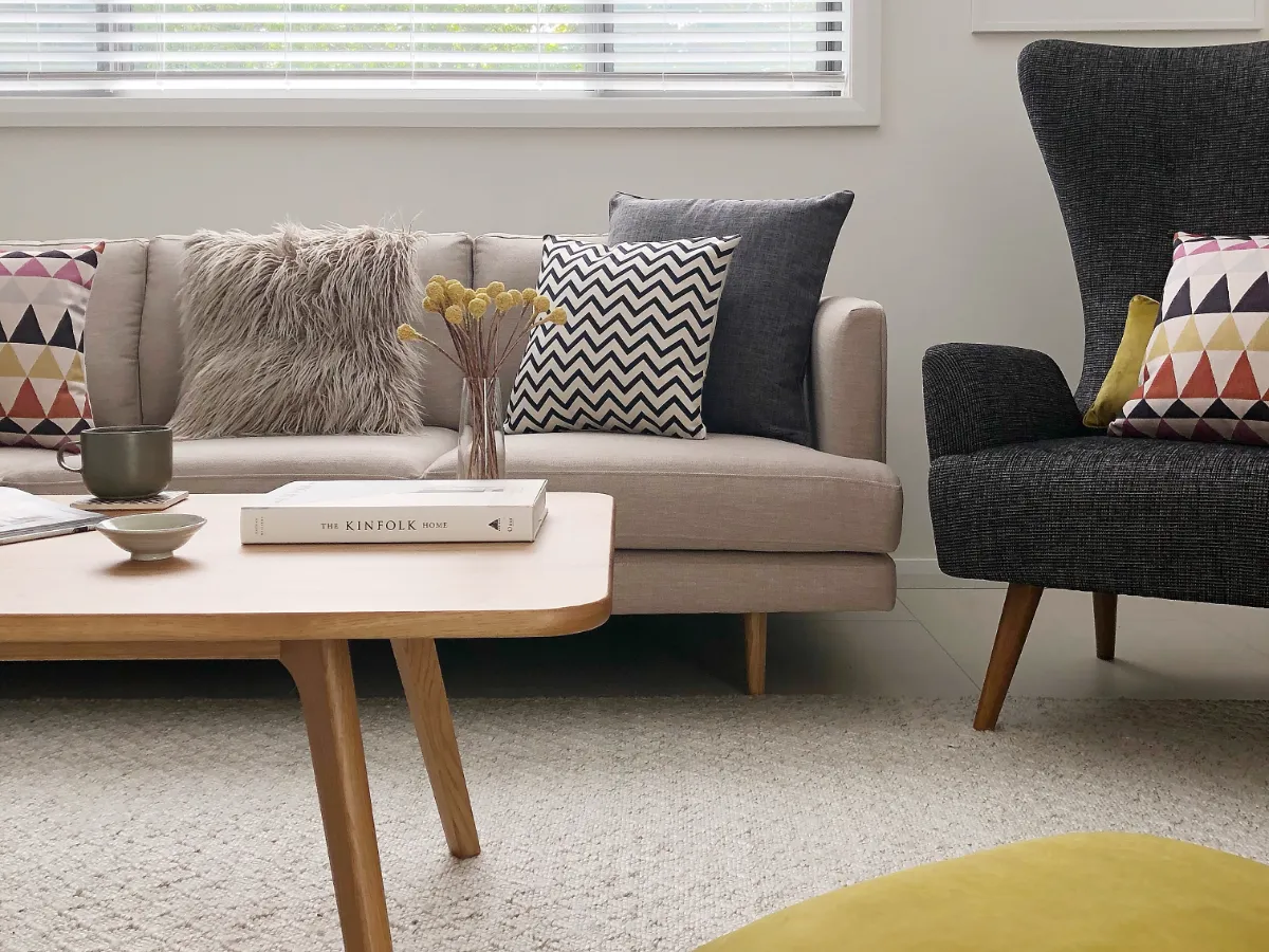 A living room with fabrics and textures that represent the mid century modern style.