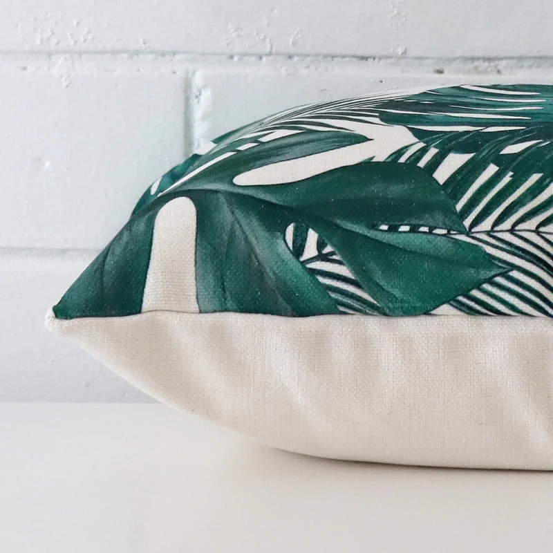 A side shot of a linen cushion cover. The angle shows the edge of the square shape.