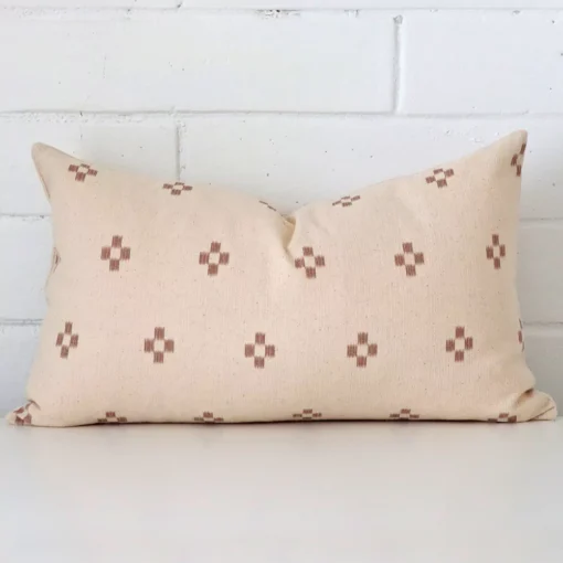 A bold designer cushion in a sleek rectangle size.