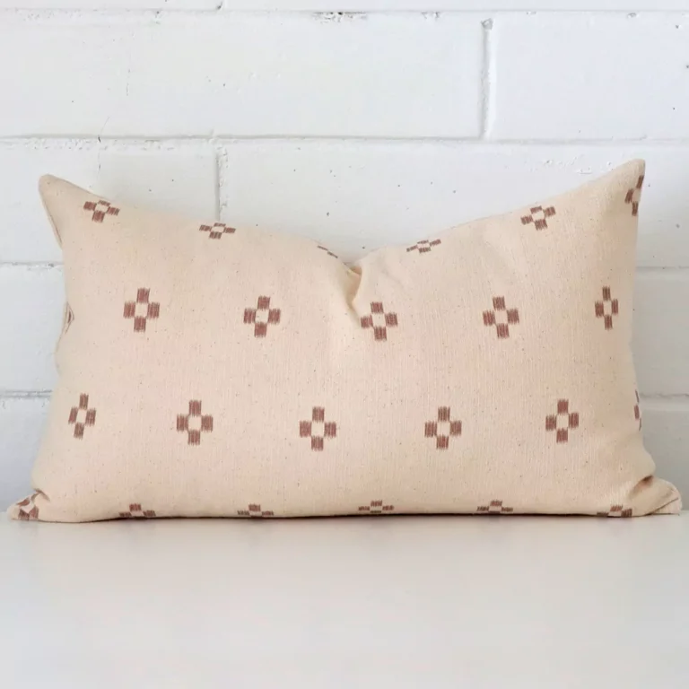 A bold designer cushion in a sleek rectangle size.