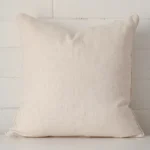 An alluring linen square cushion cover in cream.