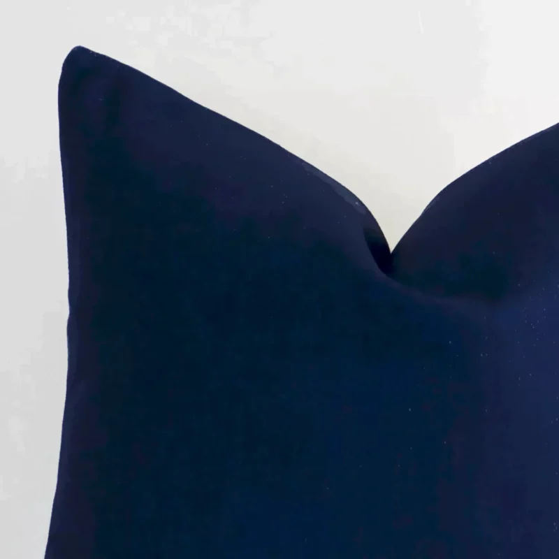 Zoomed photo of the top left corner of this midnight solid-coloured cushion cover. The image clearly shows the outdoor material and square dimensions.