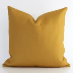 A stunning square linen cushion in a mustard colour. It has an exquisite solid colour design.
