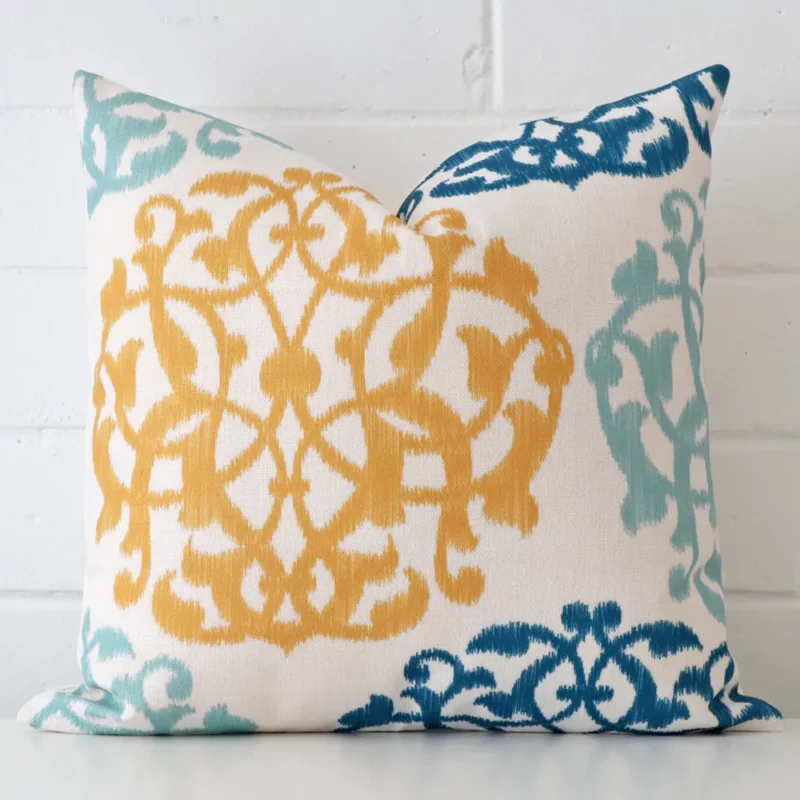 mila-motif-cushion-covers-45cm-x-45cm-sc56-45 A brick wall that has a patterned cushion cover positioned in front of it. It has an exquisite linen material and a lovely square shape.