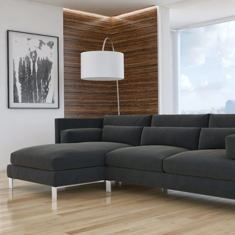 A modern living space with wood panelling and empty black seating. Perfect blank canvas for cushions for a black sofa.