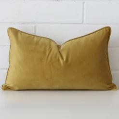 An alluring velvet rectangle cushion cover in mustard