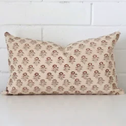An alluring designer rectangle cushion. It features an attractive floral style.