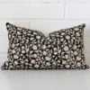 A graceful rectangle cushion with a floral style on durable designer fabric.