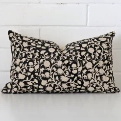 A graceful rectangle cushion with a floral style on durable designer fabric.