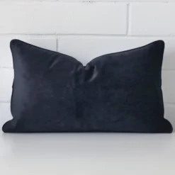 Vibrant navy cushion cover constructed from velvet fabric and shown in a rectangle size.