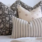 A close up shot of 4 designer bed cushions magnifying their colours and designs.
