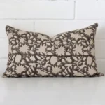 Vibrant floral cushion cover constructed from designer fabric and shown in a rectangle shape.