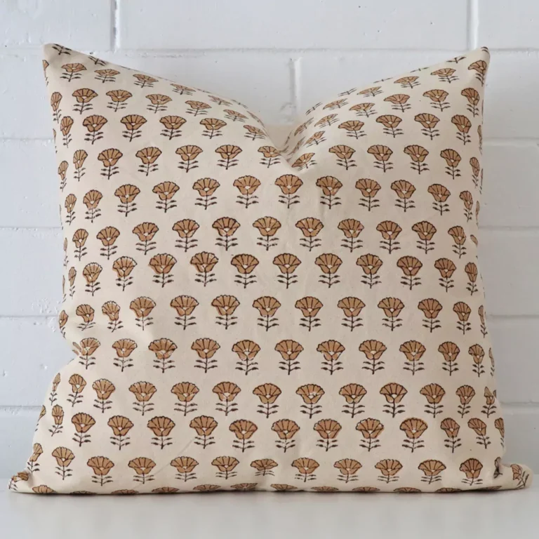 A hero shot of a floral large cushion cover. It is made from a deluxe designer fabric.