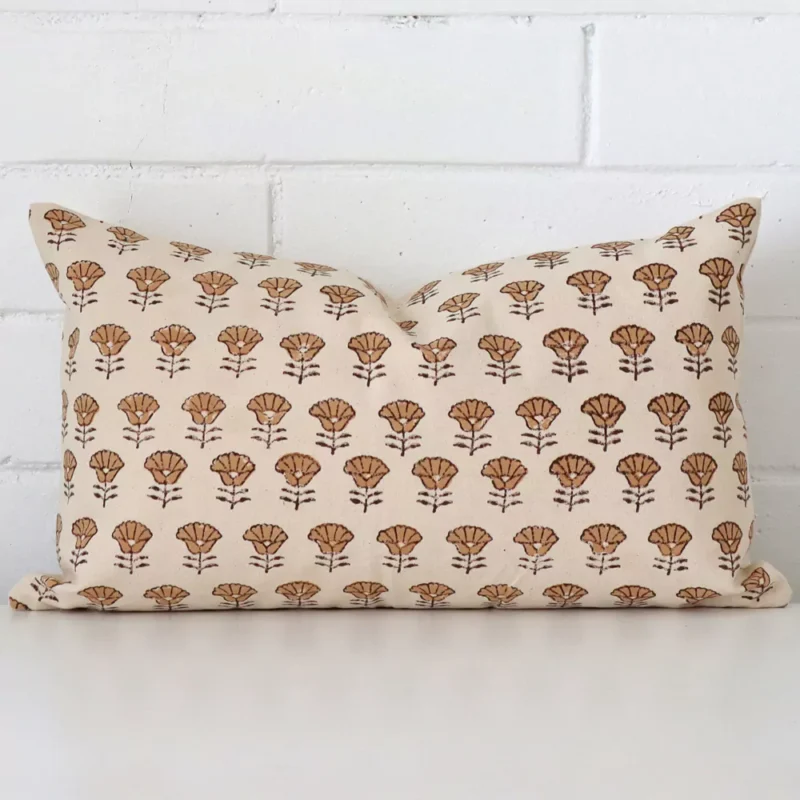 neve-floral-designer-cushion-cover-rectangle-art123-30b Here a designer cushion is shown styled against a white wall. It has a rectangle design and features a floral style.