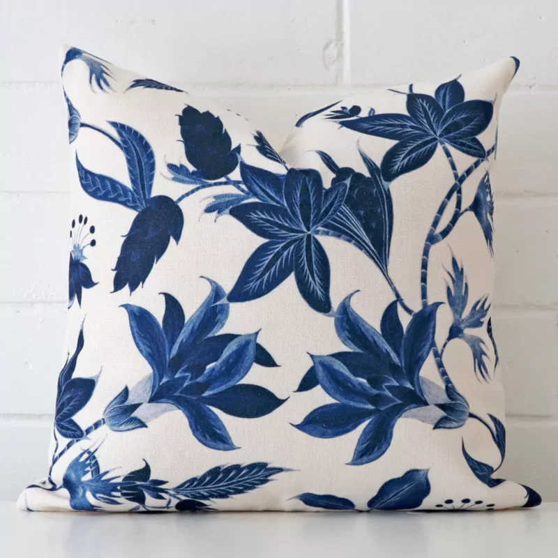 new-england-lily-cushion-cover-45cm-x-45cm-sc619-45 A hero shot of a floral square cushion cover. It is made from a deluxe linen fabric and features.