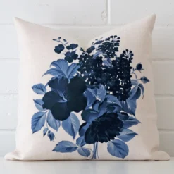 A stunning square linen cushion that has an exquisite floral design.