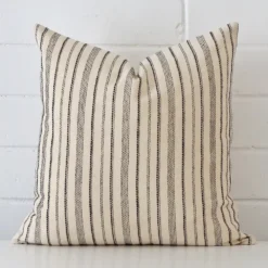 A stunning large designer cushion with an exquisite striped design.