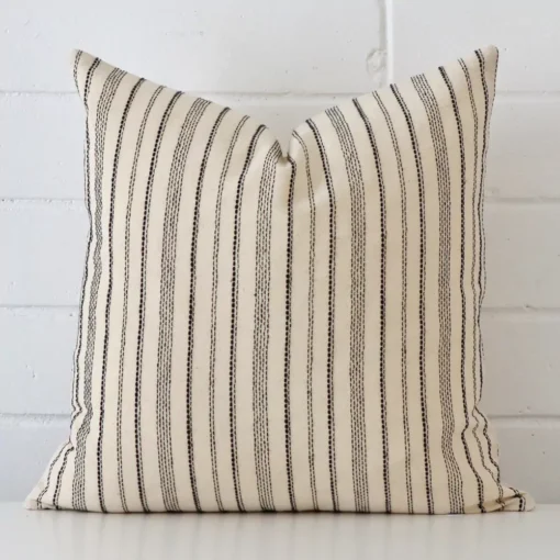 A stunning large designer cushion with an exquisite striped design.