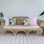 A comfy lounge with a set of 5 pink outdoor cushions inviting you to relax and unwind in tranquil surroundings.