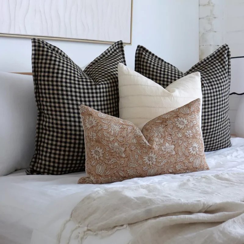 4 designer bed cushions from the Oscar set are shown close up, highlighting their colors and designs with greater detail.