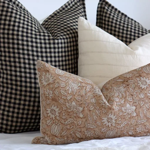 A close up shot showing the 4 designer cushions from Oscar bed cushions set.