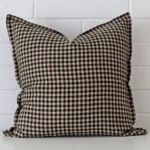 A superior designer cushion cover yielding a gingham style and in a classy large size.