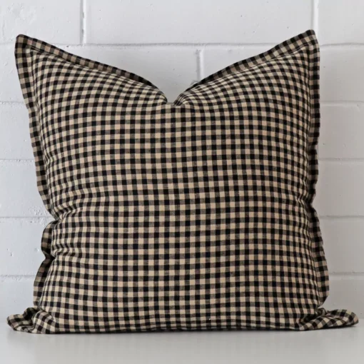 A superior designer cushion cover yielding a gingham style and in a classy large size.