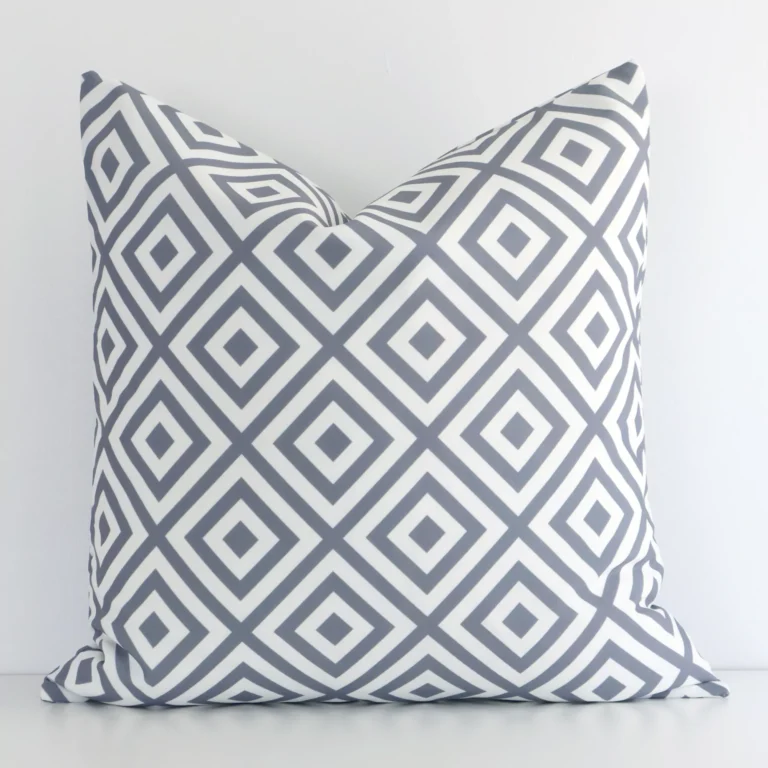An eye-catching outdoor square cushion cover featuring a hue that is grey. It has a unique geometric style.