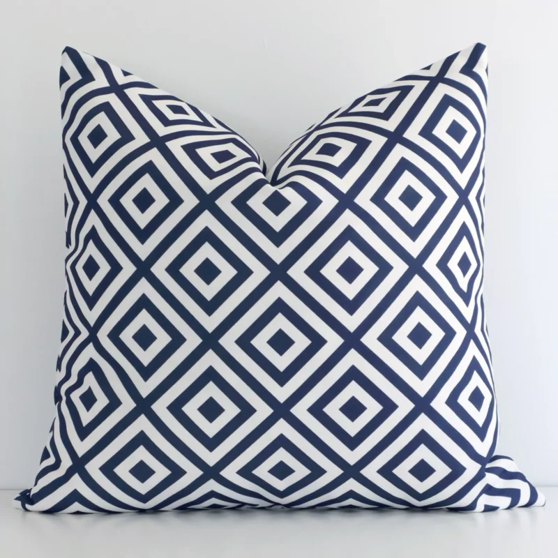 otama-geometric-waterproof-navy-outdoor-cushion-cover---sc711-45 An attractive geometric outdoor cushion in front of a white wall. It has a square shape and the print is navy in colour.