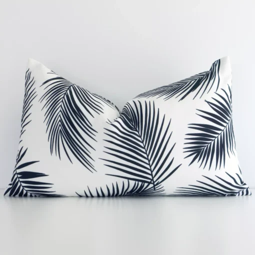 A stunning rectangle outdoor cushion in a black and white colour. It has an exquisite palm design.