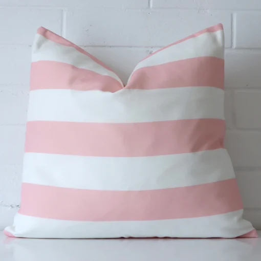 Vibrant pink cushion cover constructed from outdoor fabric and shown in a large size.