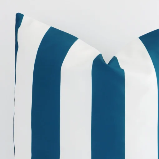 Close up image of outdoor large cushion. The image allows you to see the teal hue and stripe style more thoroughly.