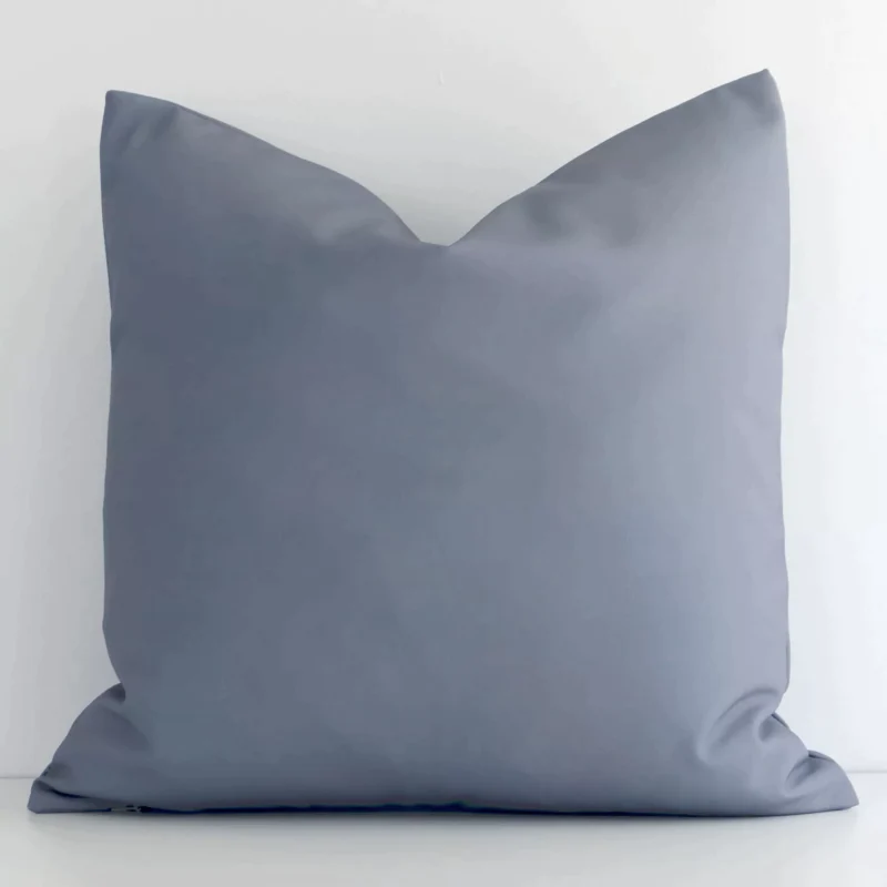 otama-waterproof-grey-outdoor-cushion-cover---sc702-45 Grey solid-coloured cushion cover sits against a white wall. It is constructed from a superior looking outdoor material and has square shape.