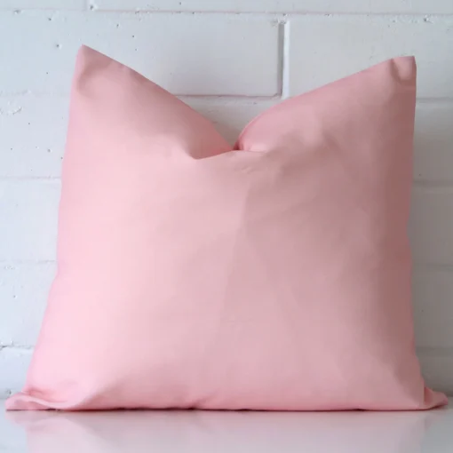 A superior outdoor pink cushion cover in a classy square size.