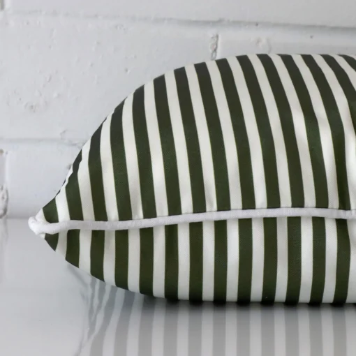 An olive green striped cushion positioned on its back panel. The shot shows a lateral view of the outdoor fabric and its square shape.