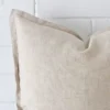 Enlarged shot of a large cushion cover that highlights the linen fabric.
