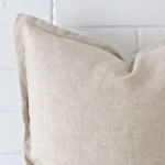 Enlarged shot of a large cushion cover that highlights the linen fabric.