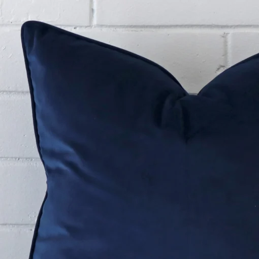 A velvet large cushion’s corner has been enlarged in this shot. The detail of the blue colour is more visible.