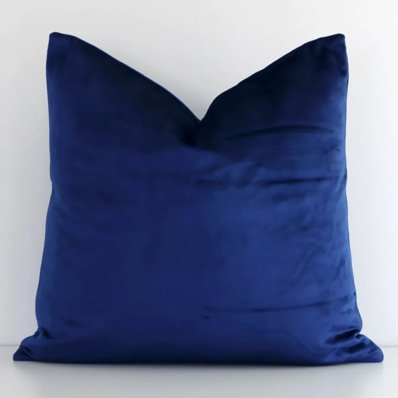 royal-blue-velvet-linen-cushion-cover---sc789-45 Velvet square cushion with a solid colour design in an upright position against a white white wall. It is royal blue in colour.