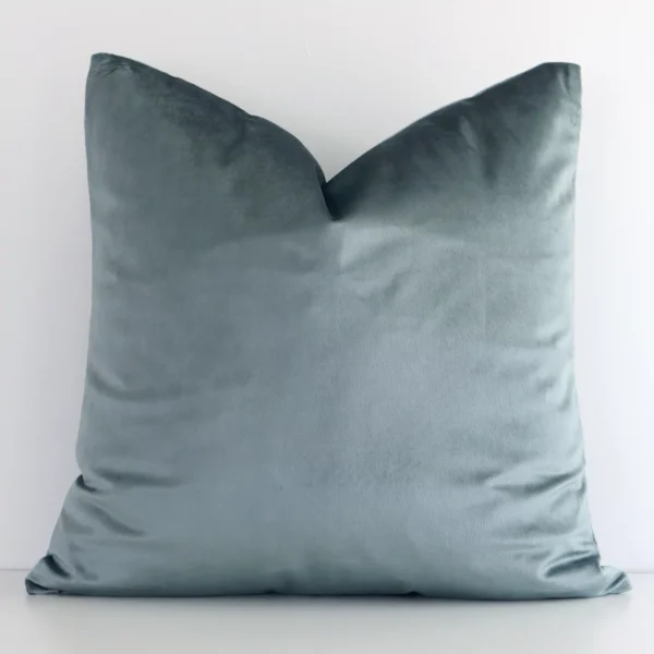 An alluring velvet square cushion cover in sage green. It features an attractive solid colour style.