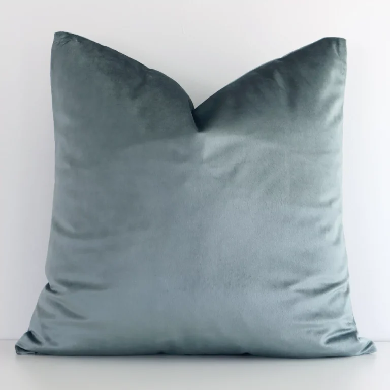 An alluring velvet square cushion cover in sage green. It features an attractive solid colour style.
