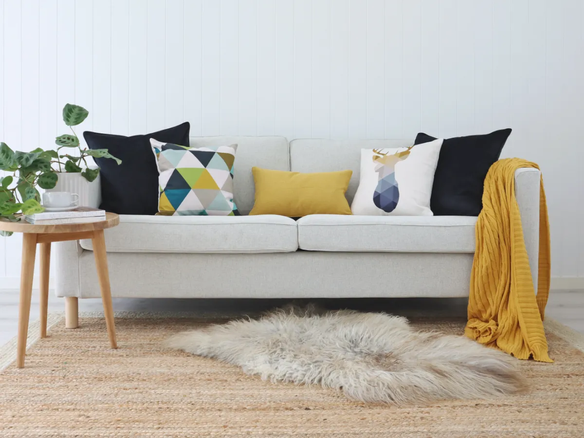 Scandi inspired sofa arrangement with Nordic motifs and colours.