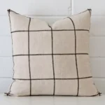 A stunning square linen cushion. It has an exquisite striped design.