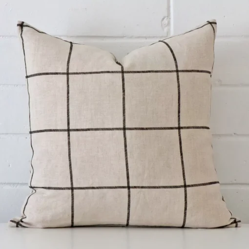 A stunning square linen cushion. It has an exquisite striped design.