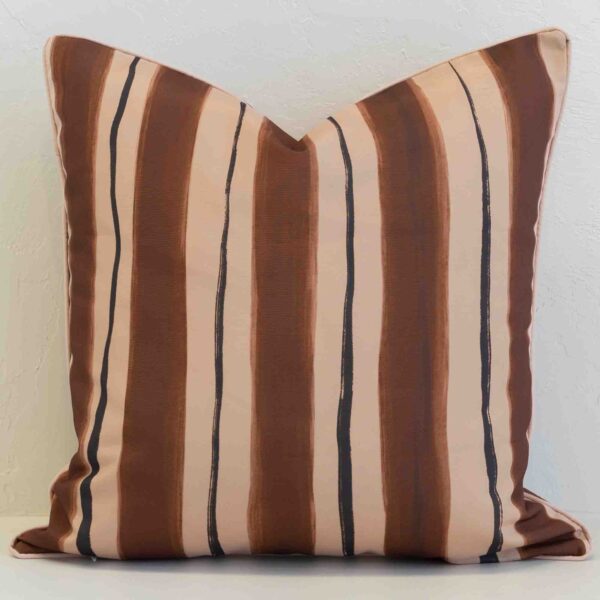 Sienna outdoor cushion with wide brown and tan vertical stripes.
