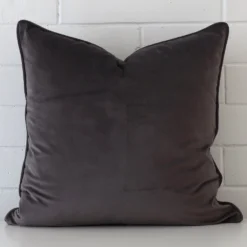 A stunning large linen cushion in a space grey colour.