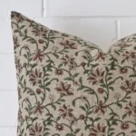 Macro image of a designer rectangle cushion cover. The shot shows the floral style more thoroughly.