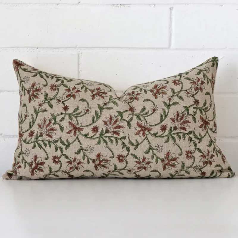 suni-floral-designer-cushion-cover-rectangle-art124-30b A pretty floral designer cushion cover is shown against a brick wall. It features a rectangle shape.